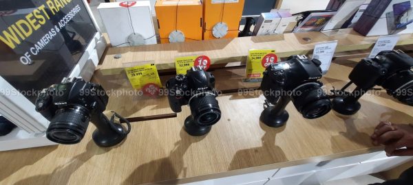 Stock Photo of Display of Nikon and Sony DSLR cameras for Sale