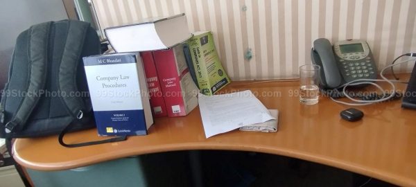 Stock Photo of Company Secretary Table with Books