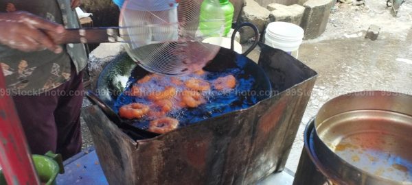 Stock Photo of Mendu Wada cooking Roadside Type 3 Hawker