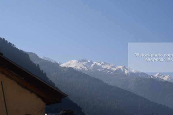 Stock Photo of Snow Clad Mountain in Summer