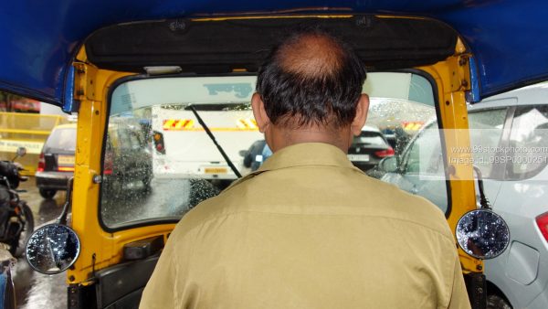 Stock Photo of Rickshaw in Mumbai in Rains