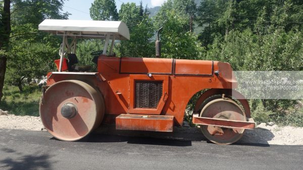 Stock Photo of Road Roller on Side of the Road Type 3