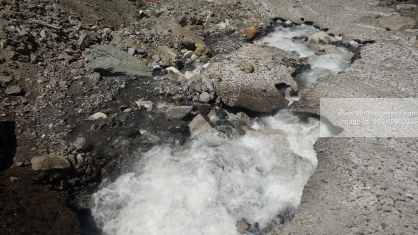 Stock Photo of Melting Himalayan Glacier and running water